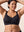 Black on model, arms up: cups stay in place
