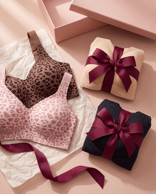 Four JellyBand bras, two tied with a ribbon as the free pair